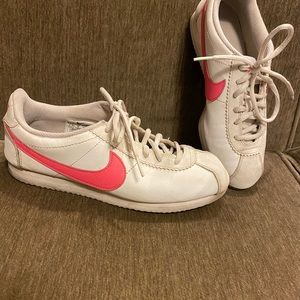 Nike Cortez hot pink swoosh.